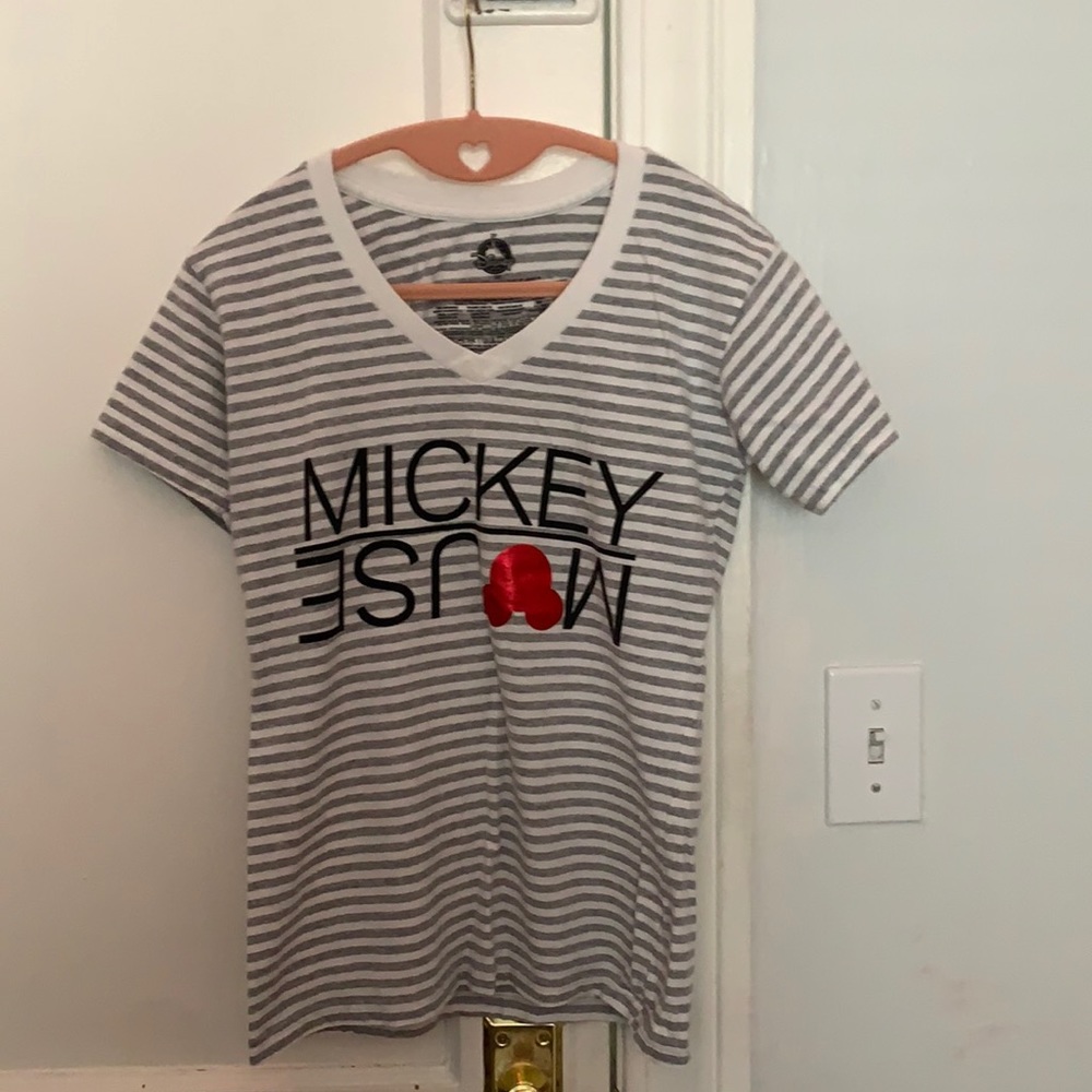 Striped Mickey Mouse shirt.